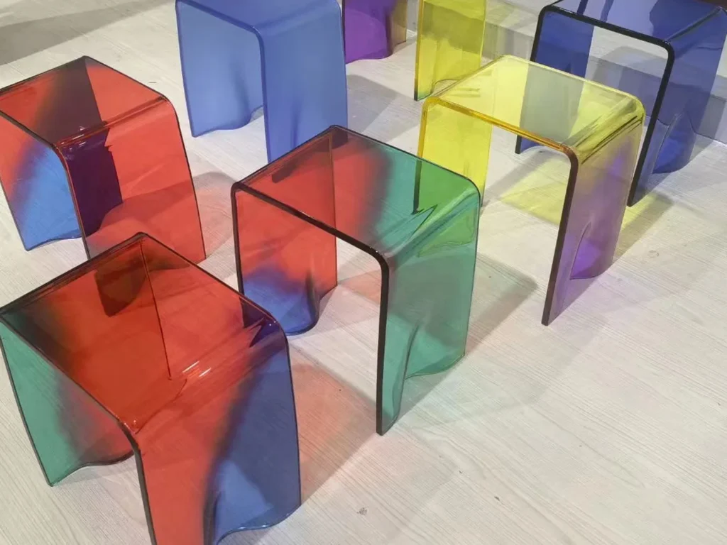 Transparent cast composite components in multiple colours