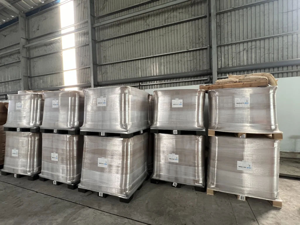 Wrapped roving pallet loads stacked in a warehouse